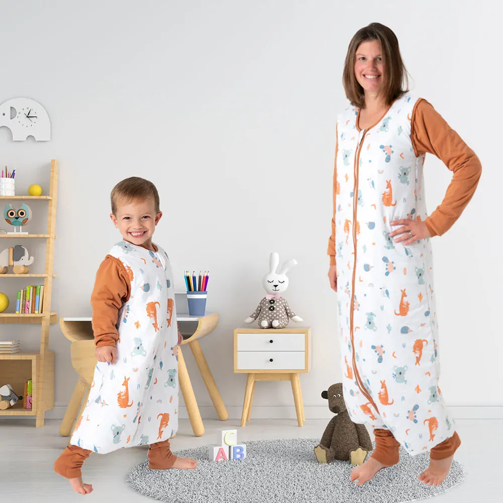 Hlavou vzhůru ZIMNÍ PROTISKLUZOVÝ spací pytel s nohavičkami a s ODEPÍNACÍMI RUKÁVY 90cm